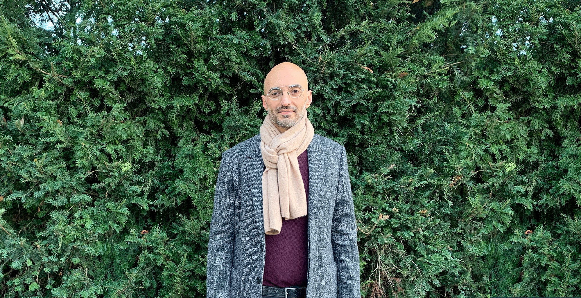 Mo Helmi of Tricoastal Scapes wearing Amour Vert's Jolie Recycled Cashmere Scarf.