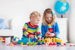 How do toys promote development in children?