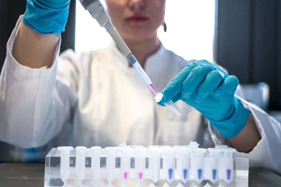 Researcher in lab, photo by Julia Koblitz