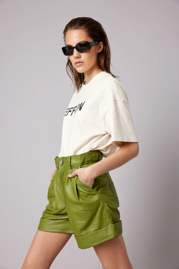 green leather shorts